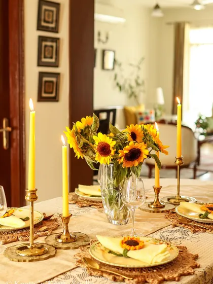 A wider shot of the dining room, with the sunflower table ready for guests.