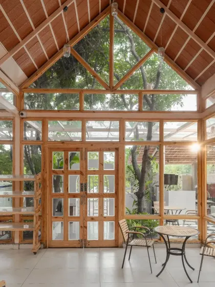 A duplicate of the main dining hall, reinforcing the spacious, light-filled interior.