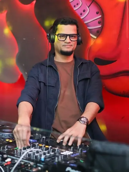 Focused on the mix during a Friday night set. My attention is always on the music and the energy of the room.