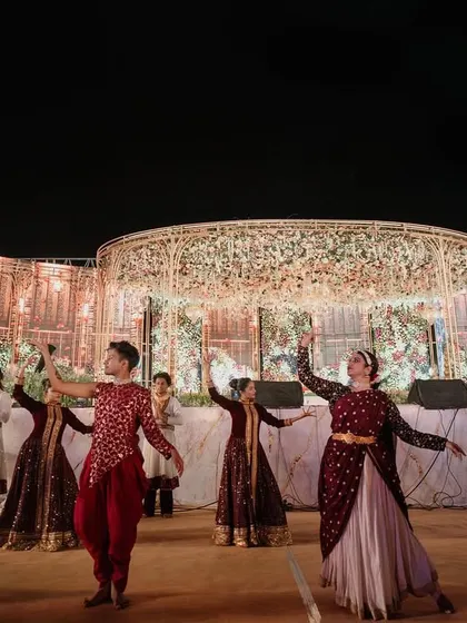 A beautifully choreographed dance performance on the grand wedding stage, adding a touch of classical elegance to the celebration.