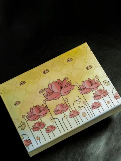 The beautiful floral-themed box for our premium Diwali hamper. We pay close attention to every detail to make your gift feel special.
