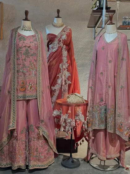 A curated collection of festive wear in shades of pink and rust. From an embroidered sharara set to a delicate organza saree, I help clients build a complete festive wardrobe.