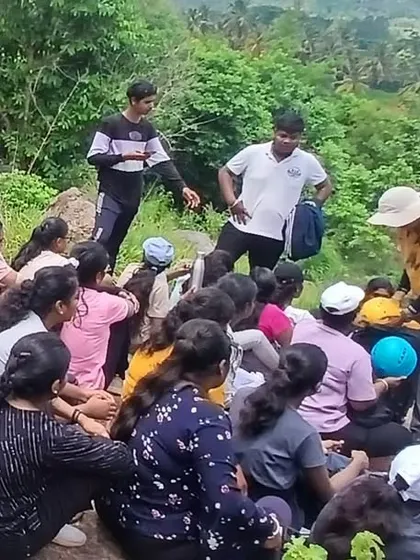 Students gather for a practical demonstration on the rocks, learning directly from our experienced instructors.