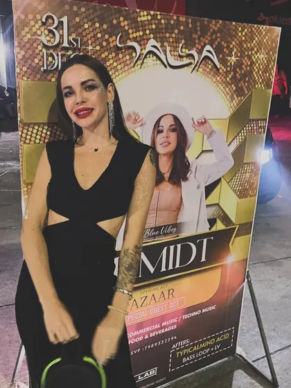 Another pose with the poster for our Salsa New Year's Eve event. We were so excited for this special night.