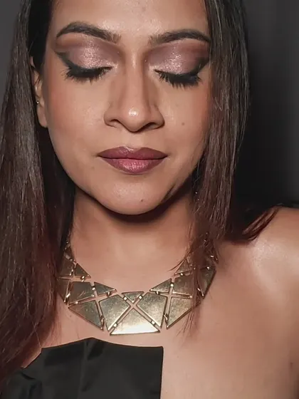 Eyes closed to show the full effect of the eyeshadow. I love creating a gradient of colors for a multi-dimensional look.
