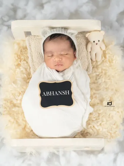 I can add a personal touch like this little chalkboard with your baby's name. It makes the memory even more special, showing the world who has arrived.