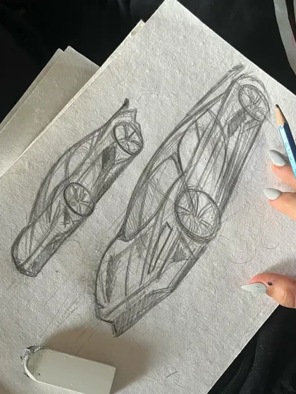 A peek at my sketchbook, where ideas for car paintings begin. These initial pencil sketches help me work out the composition and perspective before moving to the canvas.