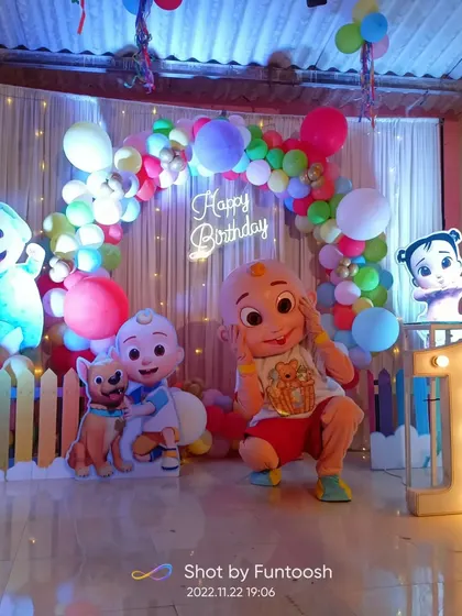 Here you can see the full setup for a Cocomelon themed first birthday. My mascot integrates perfectly with the balloon arch, cutouts, and marquee light, creating a complete and immersive experience.