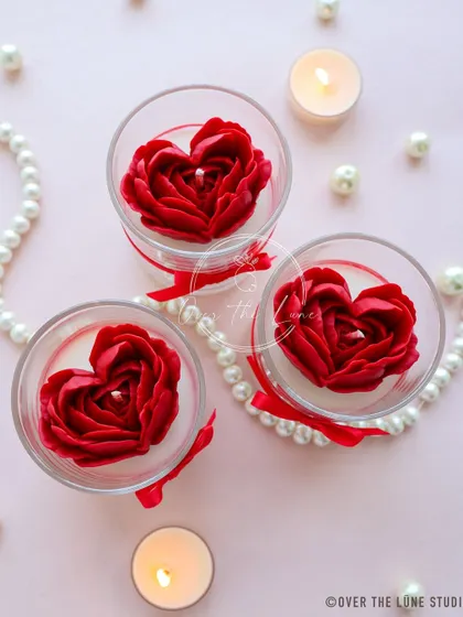 The 'Te Amo' jar candle with a passionate red rose heart. These are made with exquisite scents to set a romantic mood for Valentine's Day.