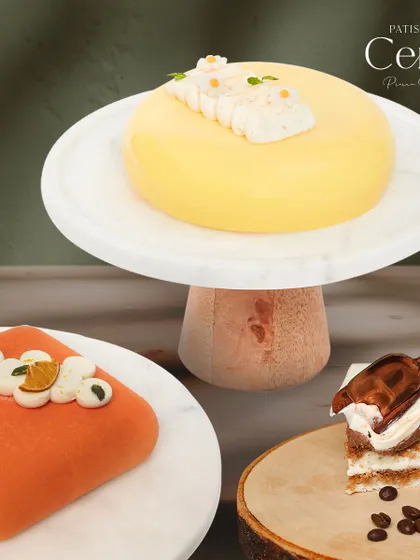 Whether you prefer bitter, citrus, or sweet, my expertise ensures I master every flavour profile. This image displays the variety, from a citrusy orange entremet to a rich coffee dessert.