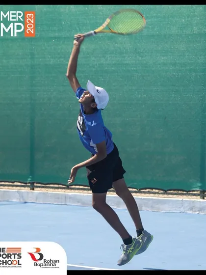 A young player leaps for a serve during our Summer Camp. We focus on developing all aspects of the game, ensuring a well-rounded and enjoyable experience for every participant.