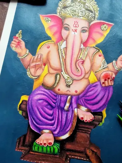 A detailed shot of the Ganesha artwork, focusing on the textures of his dhoti and the intricate jewelry.