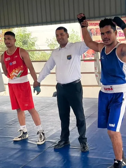Boxer Rahul Singh's hand is raised in victory at the Uttarakhand Senior Boxing Championship. A proud moment for him and the entire academy.