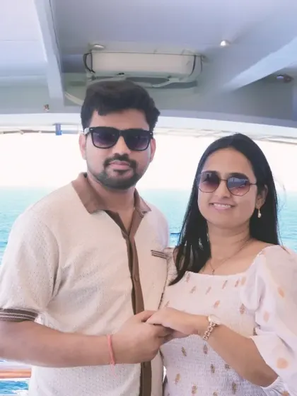 A relaxed couple portrait on a cruise ship deck with the Arabian Sea in the background. We are available for shoots in diverse settings, including on the water.