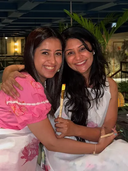 The joy of celebrating with friends at a paint party. These moments of connection and shared laughter are what make our workshops so special.