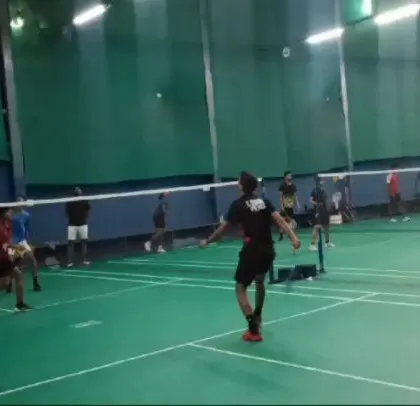 A wide-angle view of a doubles training match between my players and the Peru national team.