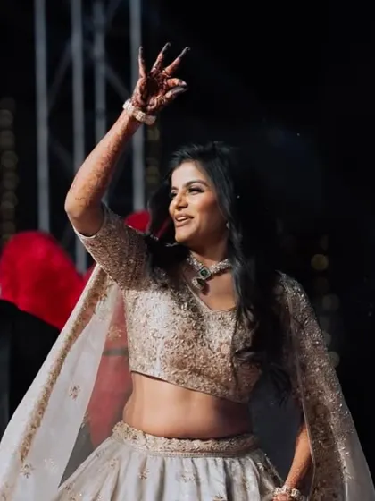 A candid shot of my bride enjoying her sangeet performance. The makeup I create is designed to be dance proof and look flawless from every angle.