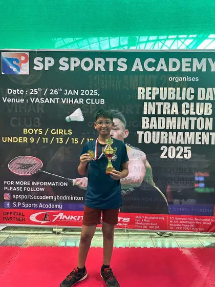 Viaan Jadhav, the winner of the U-13 Boys category, proudly displays his trophy.