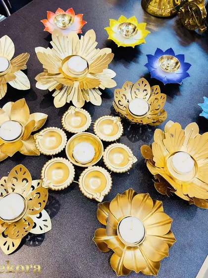 An assortment of our handcrafted metal diyas and T-light holders in various floral designs and finishes. We offer a wide selection to suit different tastes and budgets for bulk Diwali orders.