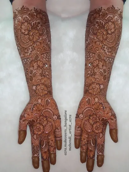 A rich and detailed bridal mehendi, perfect for a bride looking for a traditional yet unique design.