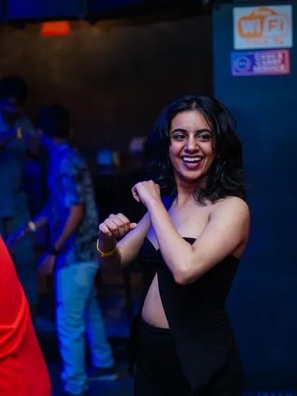 A guest dancing and enjoying the Halloween party.