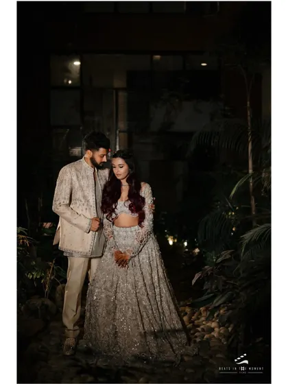 A romantic portrait of the couple from their Sangeet night. The intimate garden setting and soft lighting create a magical and private moment.
