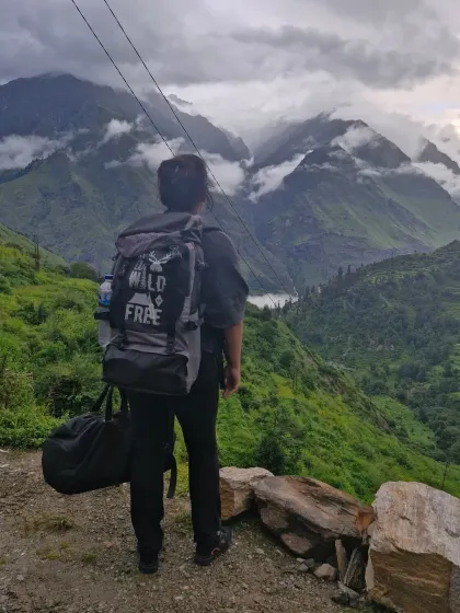 Ready for the journey ahead. Carrying my world on my back, looking out at the misty mountains, feeling a mix of excitement and peace. This is my happy place.