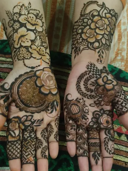 A designer pattern that mixes different floral styles, including Arabic-style flowers and more traditional Indian motifs.