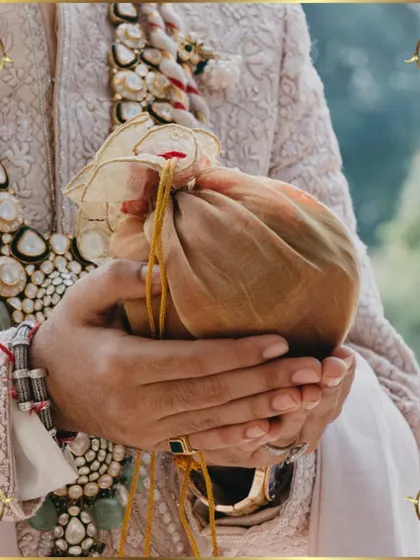 The groom holding the sacred coconut, a key element in Hindu wedding traditions.