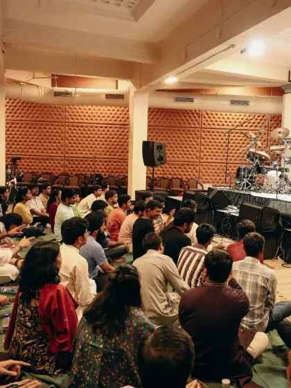 A wide view from a Gurupurnima celebration performance. Seeing an audience, young and old, sitting together and absorbed in the music is an incredibly humbling and motivating experience.