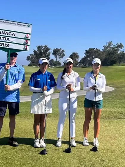 Mahreen Bhatia stands with her fellow competitors at the USwing Mojing Junior World Golf Championships. Her strong performance on this iconic course demonstrates her composure and skill on an international stage.
