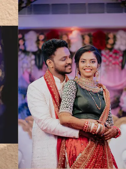 A happy portrait of the couple at their reception. They embrace and smile for the camera, looking radiant in their wedding celebration attire.