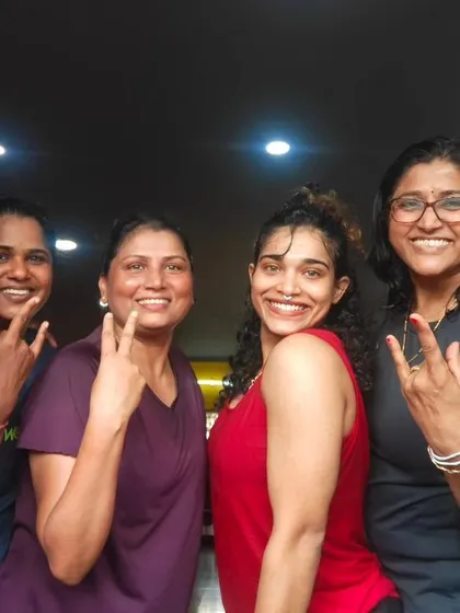 The heart and soul of my classes. Each photo captures a unique moment with my incredible community after a sweaty, joyful session. This is our shared victory lap.