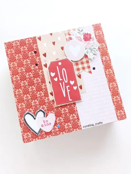 A classic red and white love-themed scrapbook cover, perfect for Valentine's Day or an anniversary.