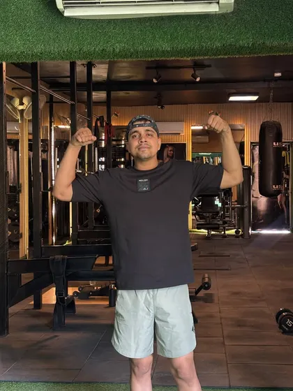 Flexing in the gym.