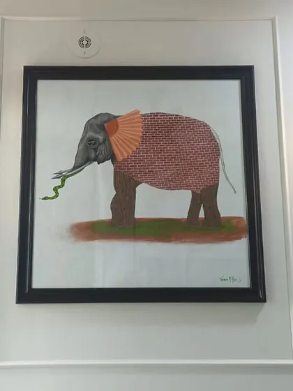 The 'Six Blind Men and an Elephant' painting, framed and displayed in the client's home.