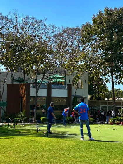 Friends enjoying a friendly putting competition. Our putting green is a great, low pressure activity for groups to engage in some lighthearted fun during a private party.