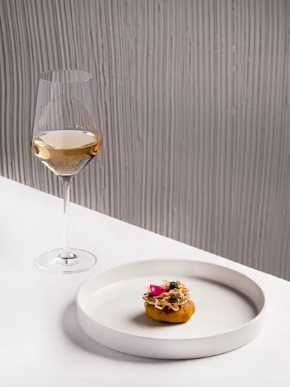 Hyderabad on the plate, Piedmont in the glass. A tender ratalu shammi, or sweet potato kebab, is filled with creamy boursin and finds its perfect counterpart in a crisp Italian white wine.