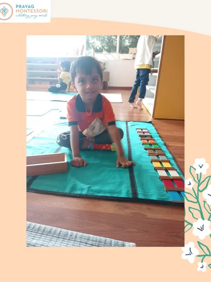 This young learner is mastering the color tablets, a key sensorial material that helps refine the chromatic sense.