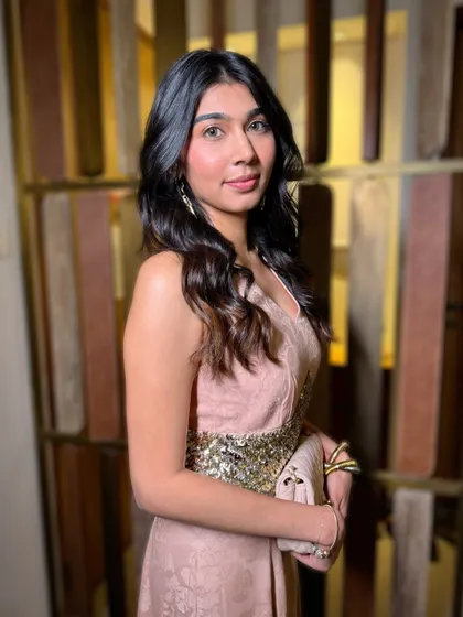 A perfect example of a clean, coquette-style makeup look. The skin is fresh and dewy, the eyes are bright, and the lips have a soft, natural tint. It's effortlessly chic.