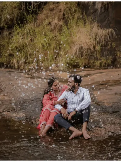A magical shot of Prem and Jinal by the water, with sparkling bokeh effects that look like fairy lights. This creative edit adds a dreamy and enchanting feel to their romantic portrait.