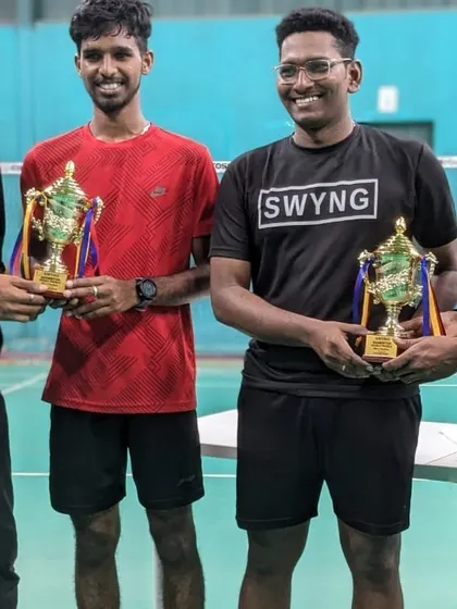 The champions and runners-up of our Men's Open Doubles tournament posing with their well-earned trophies.