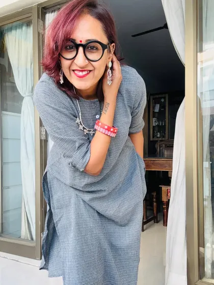 A playful pose in my grey outfit. I believe fashion should reflect your personality.