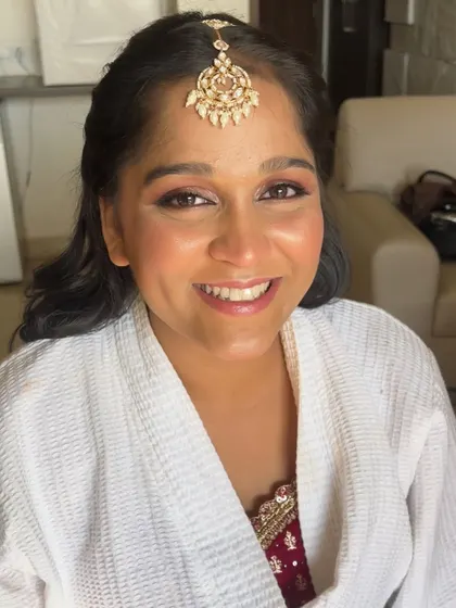 A happy, smiling bridesmaid. My goal is to make everyone in the bridal party feel comfortable and beautiful.