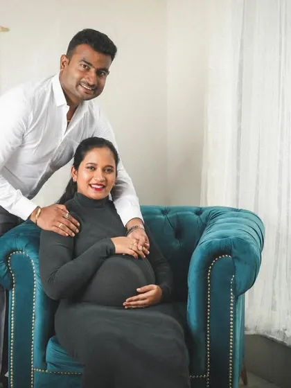 A classic and elegant couple portrait in my studio's lifestyle corner. They look so happy and connected as they prepare to grow from a family of two to three.