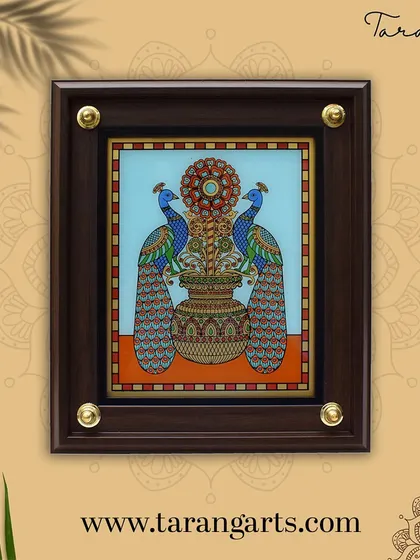 This glass painting features two peacocks flanking a traditional 'kuthu vilakku' (lamp), symbolizing beauty and light. It's a perfect piece for an entryway or living room, blending artistry with auspicious symbolism.