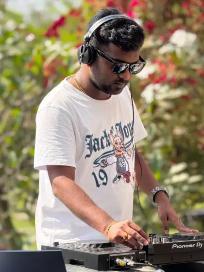 Another look at me working the Pioneer DJ decks. Having reliable, industry-standard equipment means I can focus on creativity and performance.