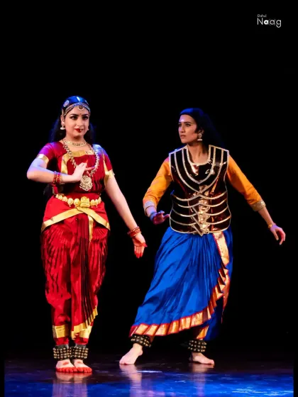 A scene depicting the complex relationship between characters in "The Wheel of Choices." My student portrays Draupadi, interacting with my character, Karna, in a moment of dramatic tension.
