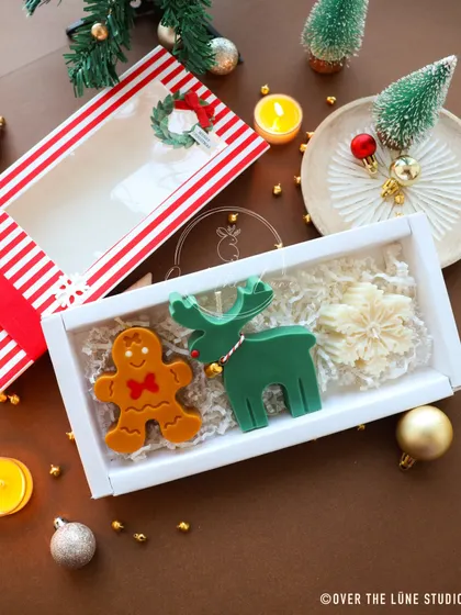 Another one of my Christmas gift box combinations, this one with a gingerbread man, a green reindeer, and a snowflake candle. Perfect for a rustic holiday theme.