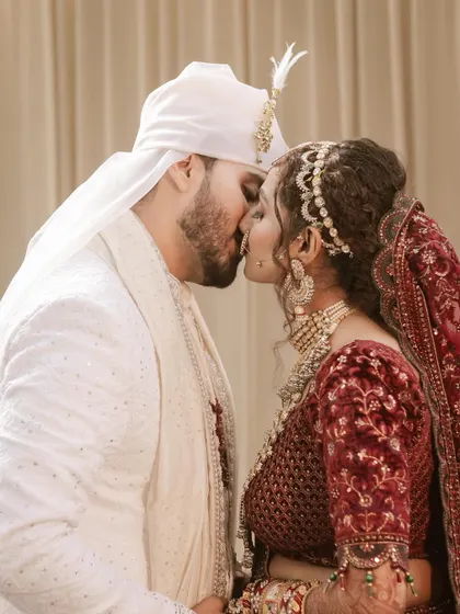 A wedding day kiss. This classic shot is a must-have, and we make sure to capture it with all the emotion and beauty it deserves.